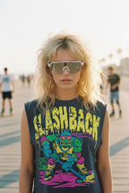 Person wearing a sleeveless shirt with 'SLASHBACK' graphic design on a beach.