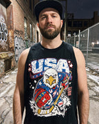 Man wearing a tank top with a USA-themed graphic in an urban setting